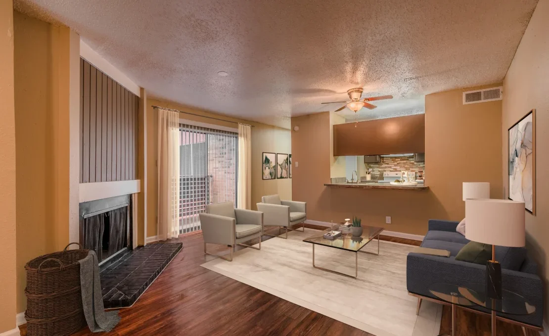 the living room has hardwood floors and a fireplace at The Tribeca On  Creek